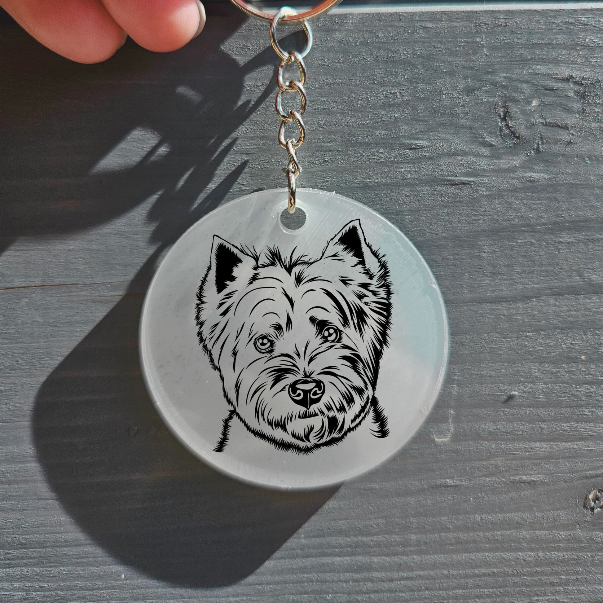 West Highland Terrier Face on a round acrylic keyring